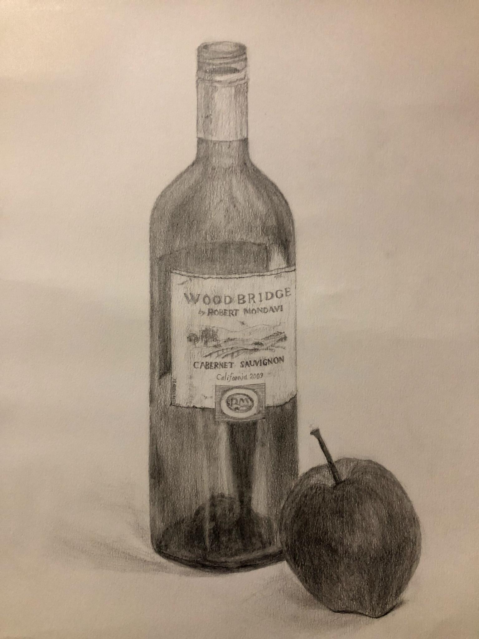 A wine bottle and an apple - 20240618